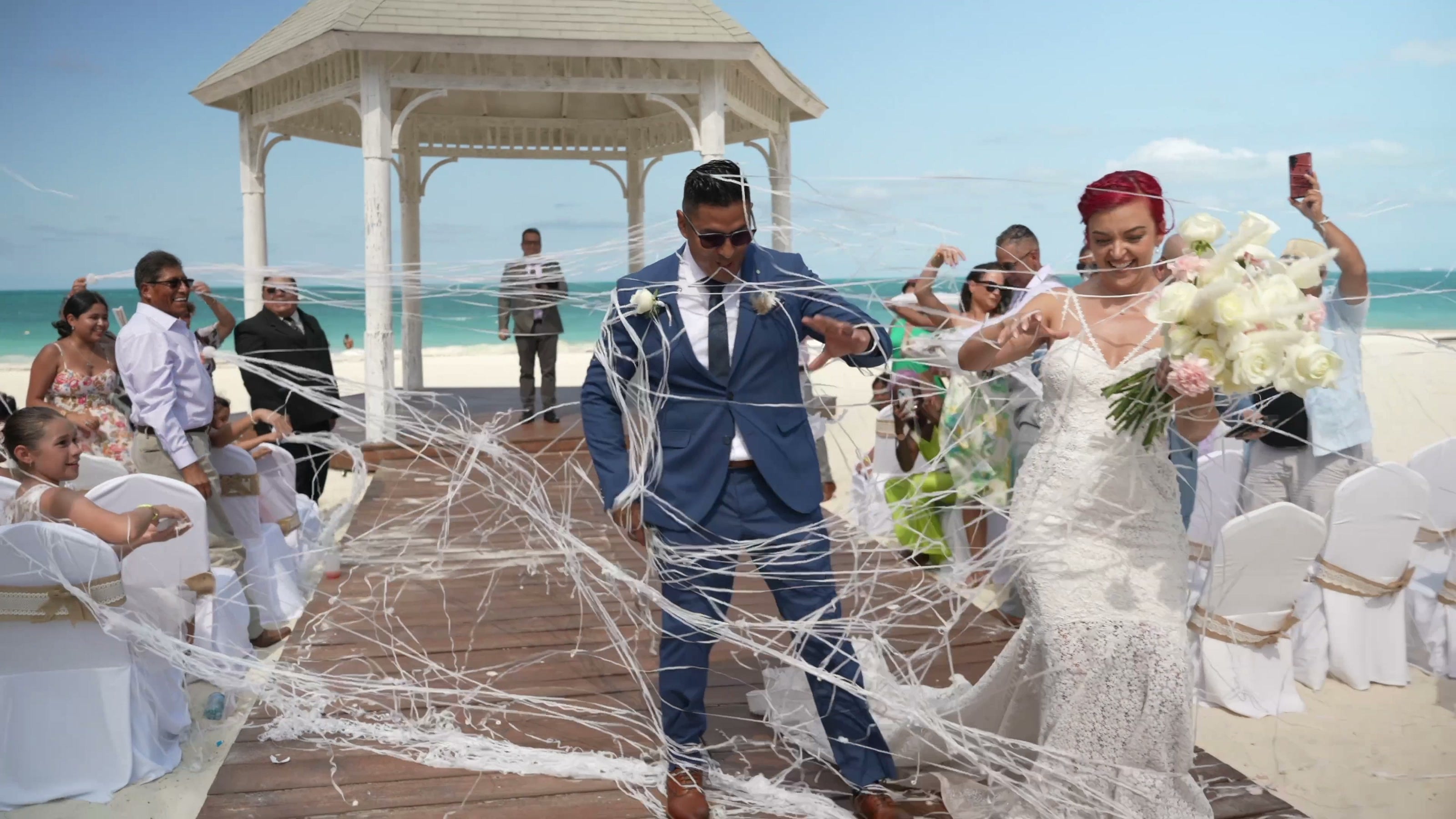 A wedding celebration with family and friends by the ocean